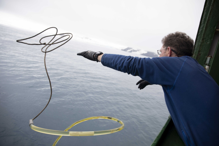 Abbie Trayler-Smith  Scientist Tim Lewis deploys the Hydrophone to listen to Whales on board the Arctic Sunrise with Greenpeace in Antartica. Whales and dolphins make unique sounds whilst feeding and socialising. Greenpeace’s ship Arctic Sunrise is using a towed hydrophone array (underwater microphone) to survey for whales in the Antarctic. Scientistis will then analyse these recordings to better understand species distributions in this unique region.  Greenpeace is back in the Antarctic on the last stage of the Pole to Pole Expedition. We have teamed up with a group of scientists to investigate and document the impacts the climate crisis is already having in this area.