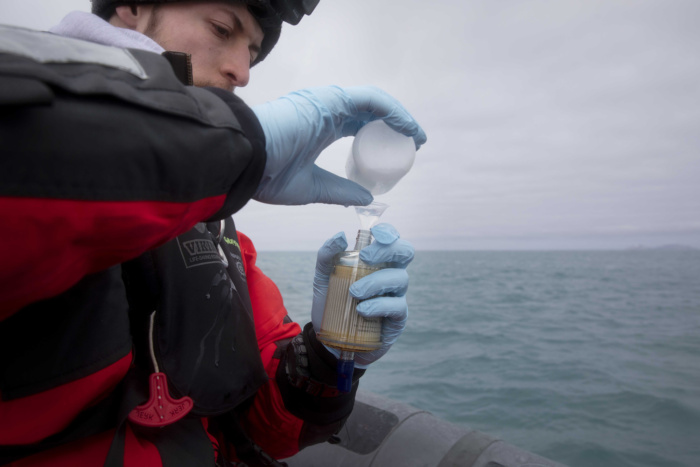 Abbie Trayler-Smith  Scientist Nacim Guellati collect water samples for EDNA sampling in the waters around Elephant Island.  eDNA monitoring uses filters to trap free-floating DNA that has been left behind by animals. In the laboratory, the DNA can help identify marine biodiversity, specifically whales, seals, birds and fish. The research will contribute to a better understanding of Antarctic waters, a marine ecosystem that is rapidly being altered by climate change. 
Greenpeace is back in the Antarctic on the last stage of the Pole to Pole Expedition. We have teamed up with a group of scientists to investigate and document the impacts the climate crisis is already having in this area.